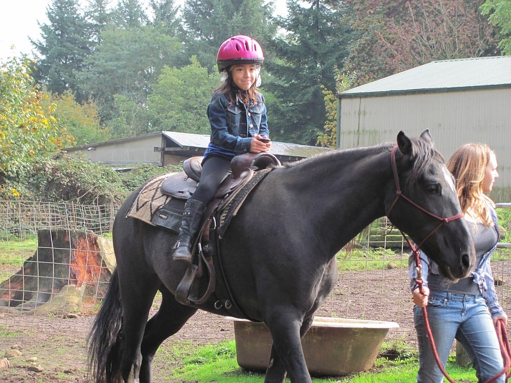Horseback riding brought smiles to several young attendees Saturday. Even the weather cooperated, as sunny skies overcame a previously gloomy day.
