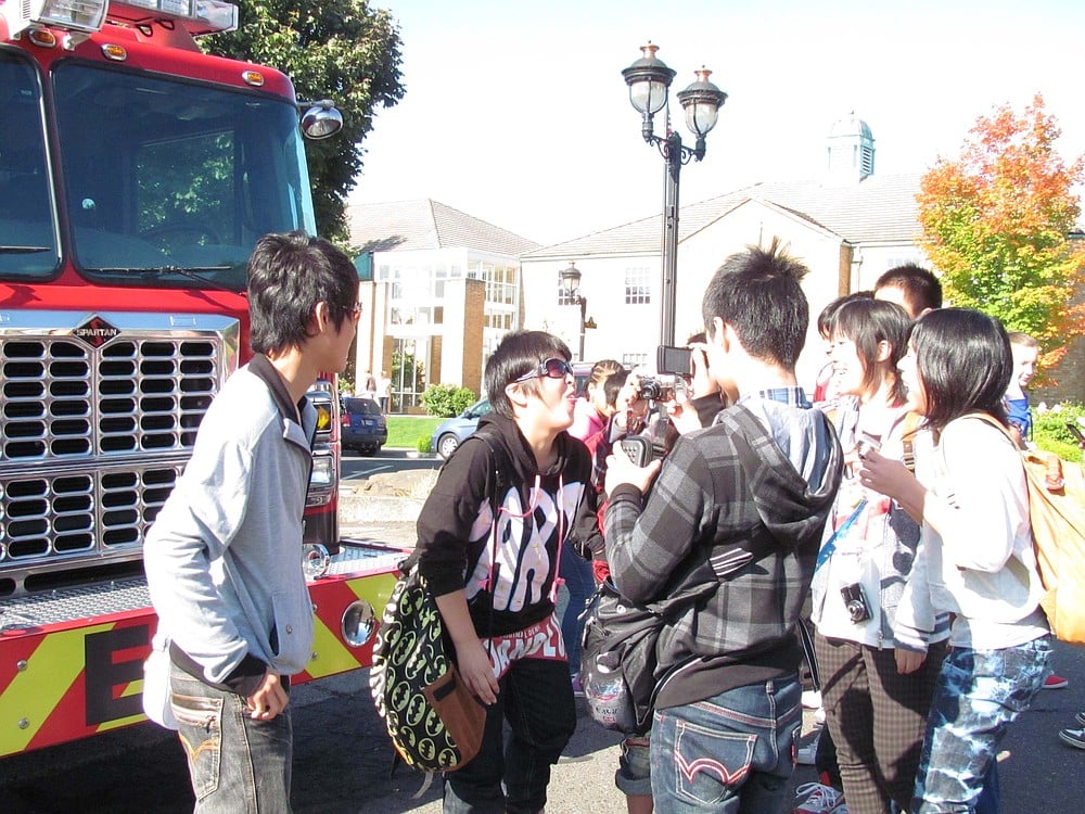 Taki middle school students share some fun moments outside the Camas Fire Department last week.