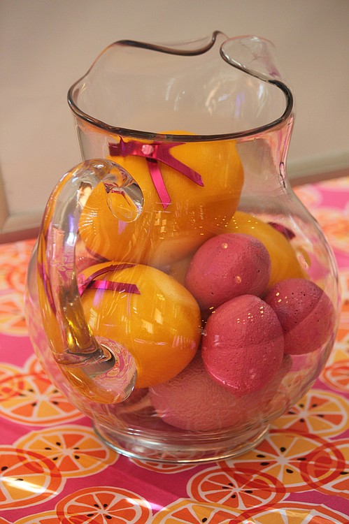 A colorful pitcher adorned a raffle basket table at the Columbia Ridge Senior Living Pink Tea Party.