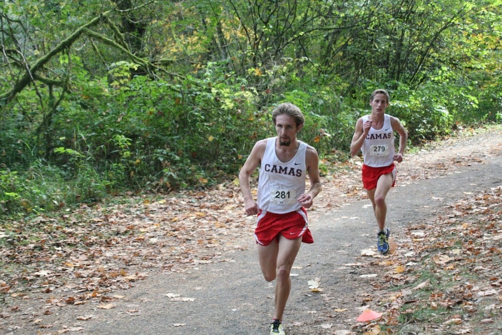 Camas seniors Andrew Duffy (front) and Tucker Boyd (back) hit the switchback trail toward the finish line during the 4A district boys championship race Thursday, at Lewisville Park in Battle Ground. See more photos from this event at www.camaspostrecord.com.