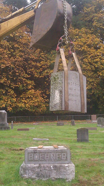On Friday, crews work to replace the Camas Cemetery headstones that were toppled over by vandals earlier in the week. There has been one arrest so far in the case. The headstone of Alexander Stuber, who died in 1908, was the only one broken into pieces, making it unrepairable. Donations are being accepted at Riverview Community Bank to fund a replacement, which is expected to cost approximately $700.