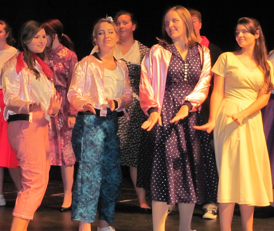 The Pink Ladies, from left, Samantha Eakins, Danielle Devall, Sydney Valaer, Keira Stogin and Liza Hess sing back-up on "Those Magic Changes."