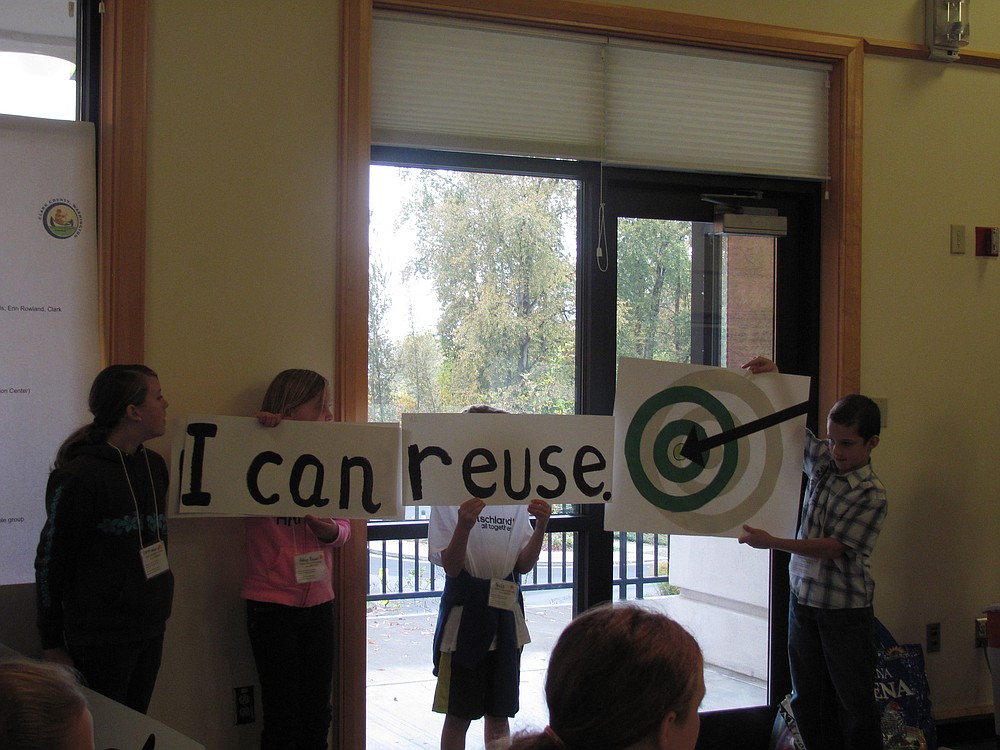 Students from Grass Valley Elementary School share their ideas on how to save the enviornment, which include these informational signs.