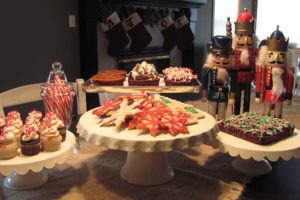 Holiday treats fill the table at Kimberly Koch's house. Some of the gluten free items include sea salt caramel rocky road and peppermint brownies, cookies and cupcakes.