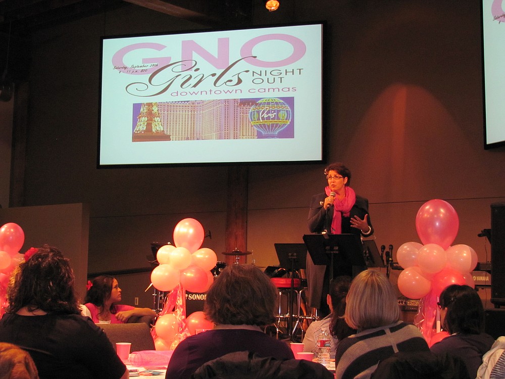 Krista Colvin is a motivational speaker and lifestyle expert, as well as a breast cancer survivor. She and her husband, Michael, attended a couples retreat sponsored by the Pink Lemonade Project. Here, she speaks at a recent Girls Night Out event.