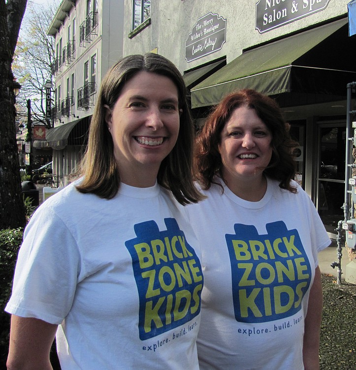 Carrie Hopkins, left, and Nikki Mael recently started BrickZoneKids in Washougal. The two teachers are hoping to expand their business to the Camas area.