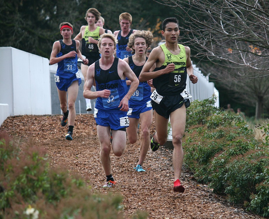 Said Guermali (56) lost his shoe somewhere on the Nike World Headquarters campus Sunday, but it didn't stop the Camas High School senior from crossing the finish line at BorderClash.