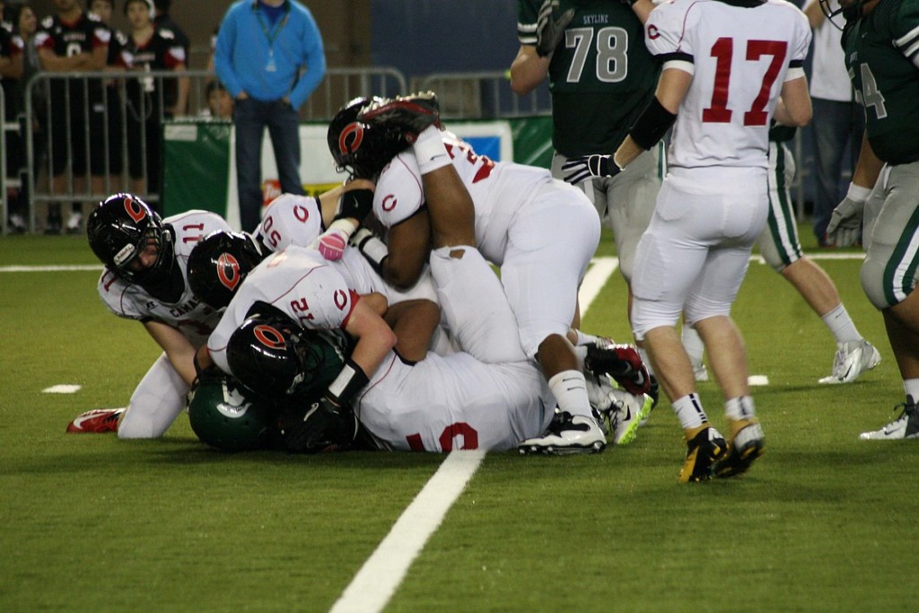 Colton Dowd, Macon Sumpter, John Norcross, John Ashford and Jason Vailea bury a Spartan.