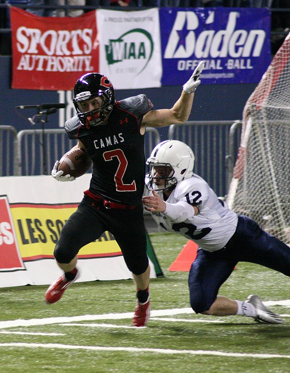 Zach Eagle glides by a Bellarmine Prep Lion and lands in the end zone for his third touchdown of the game. The Camas Papermaker caught 11 passes for 170 receiving yards.