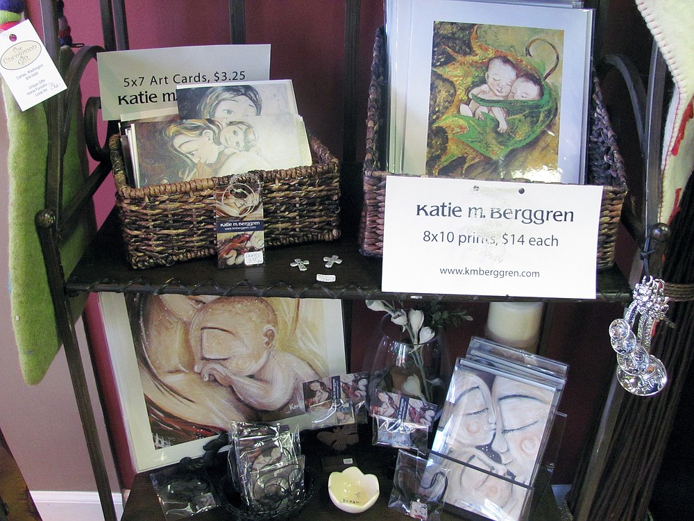 Paintings, featuring intimate moments of motherhood, are for sale at The Uncommon Gift in Camas. Artist Katie Berggren is a east Vancouver resident.