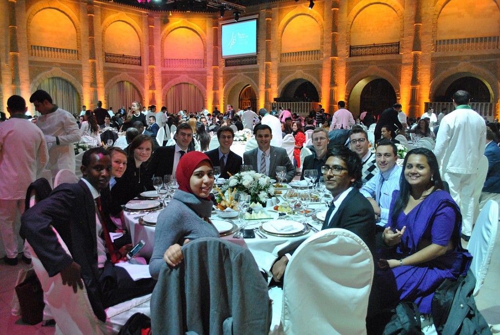 Kellogg participates in an opening ceremony dinner during her trip.