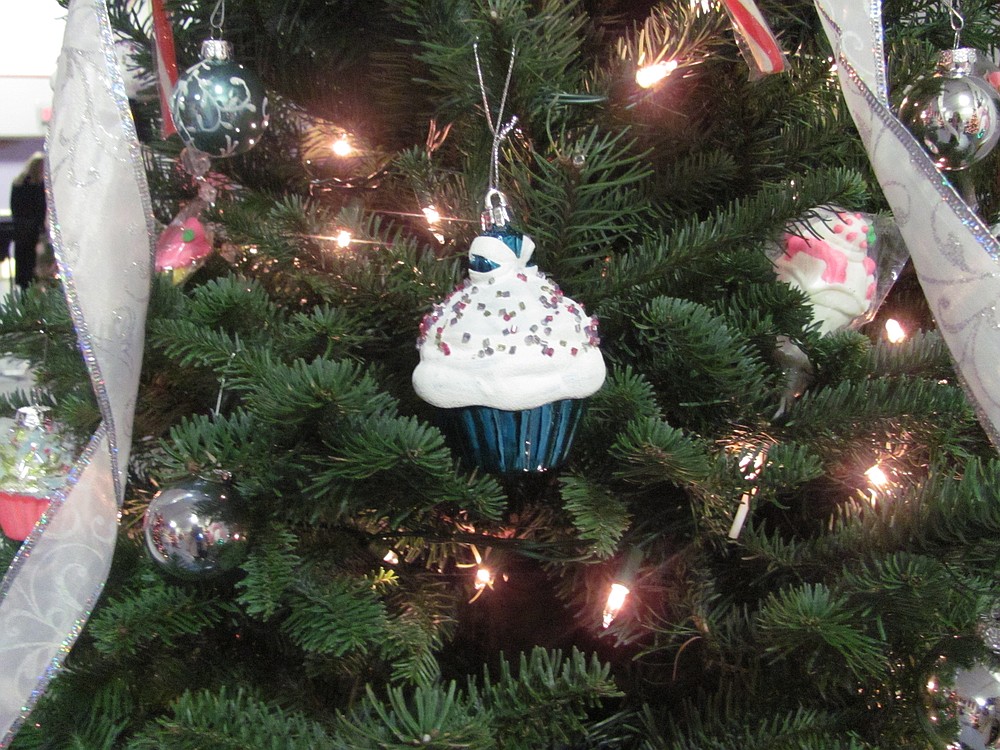Tasty treats adorned this tree from the Wildflour Cafe and Cupcakes in Washougal. The cafe is located in the same spot as the former Papa's Ice Cream, whose owner Ivan Gering helped start the Festival of Trees.