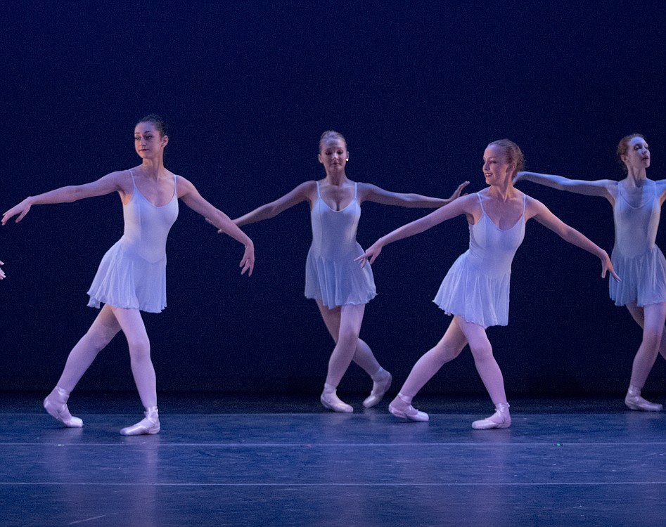 Annie and Hope Garcia (front row) perform during a master's workshop at The Portland Ballet this past August. Both girls enjoy dance for different reasons. Annie loves the challenges of learning new steps, while for Hope, performing for an audience is the "zenith" of it all.