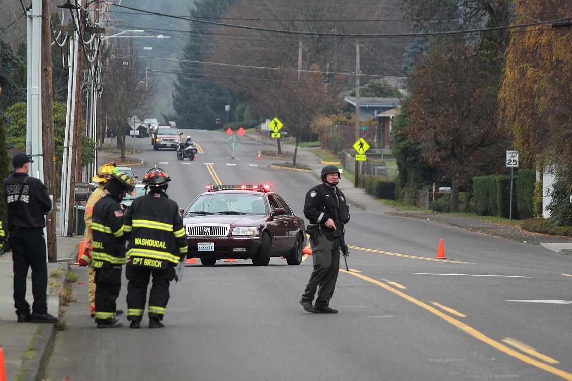 Police closed a four-block area in Washougal Wednesday morning as they responded to reports of shots fired and a house on fire. All businesses and residences between 32nd and 34th Streets, and between Evergreen Way and Webster Lane were evacuated. Four schools were also on lock down.