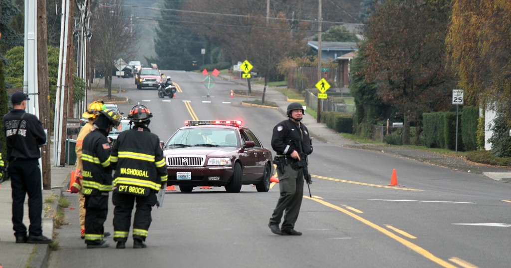 Police closed a four-block area in Washougal Wednesday morning as they responded to reports of shots fired and a house on fire. All businesses and residences within a four-block area between 32nd and 34th Streets, and between Evergreen Way and Webster Lane were evacuated. Four schools were also on lock down.