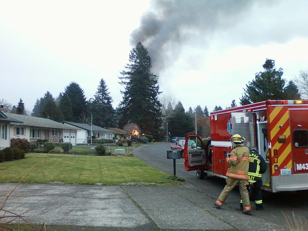 This photo, taken at approximately 8:15 a.m. Wednesday morning by "F" Place resident Claude Rorabaugh, shows the home at 3275 "F" Place up in flames.