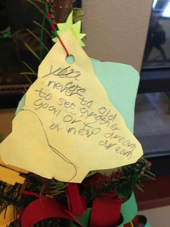 The students wrote messages of hope and encouragement on paper ornaments, which they used to decorate a small tree that was delivered to Prestige Care in Camas.