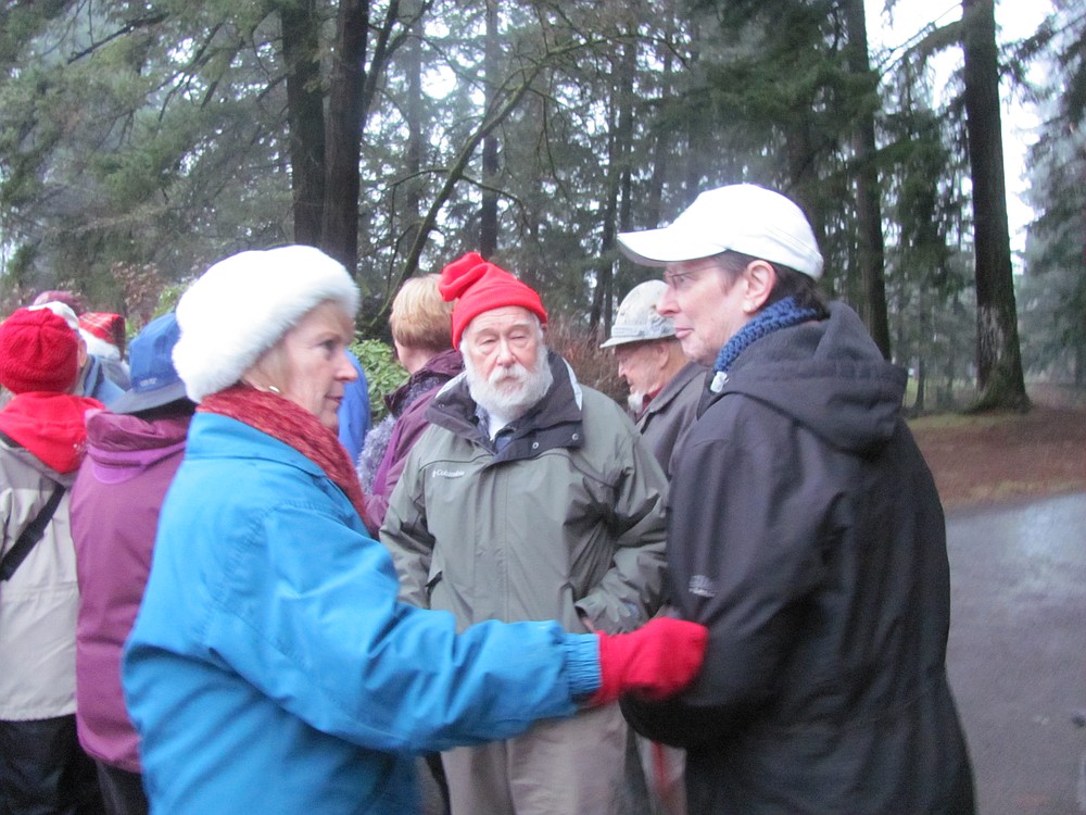 Karen Sonneson (left) chats with Kathy Kelly and Fred Cormack before a recent walk around the Round Lake and Lacamas Creek trails.