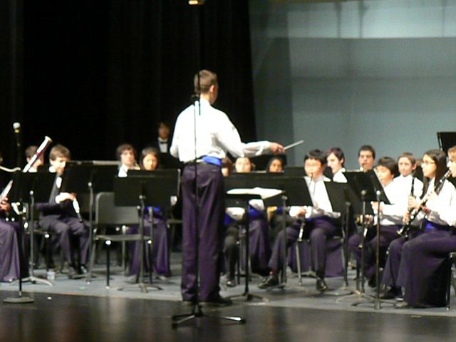 Neumann conducts "Semper Tubas" for the Metropolitan Youth Symphony Concert Band.