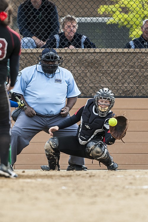 Camas catcher Erin Tauscher frames the pitch on the outside corner of home plate.