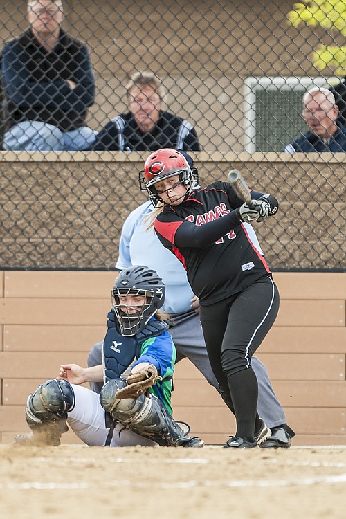 Erin Tauscher delivers a base hit for the Papermakers.