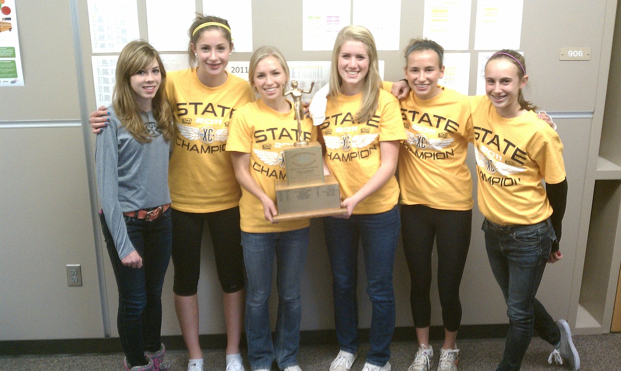 The Camas girls are still smiling two days after winning the state championship. Left to right: Alissa Pudlitzke, Trisha Patterson, Austen Reiter, Lindsay Wourms, Megan Napier and Alexa Efraimson. Camille Parsons was unavailable for the photo because of a "Running Start" class at Clark College.