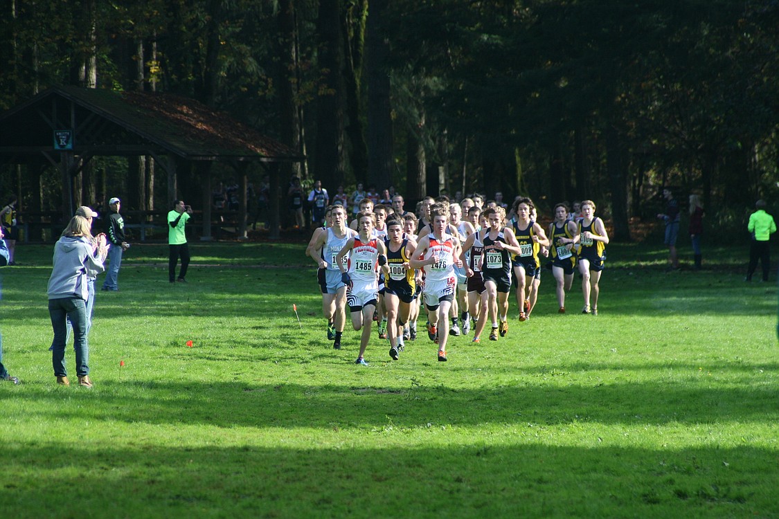 Washougal runners Isaac Stinchfield and Sean Eustis make their way to the front of the pack.