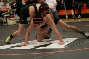 Teammates Roger Polanco (top) and Tony Maniscalco (bottom) wrestled each other in the semifinal round of the Washougal River Rumble Saturday, at Washougal High School. Polanco earned the 132-pound championship medal and Maniscalco finished in fourth place.