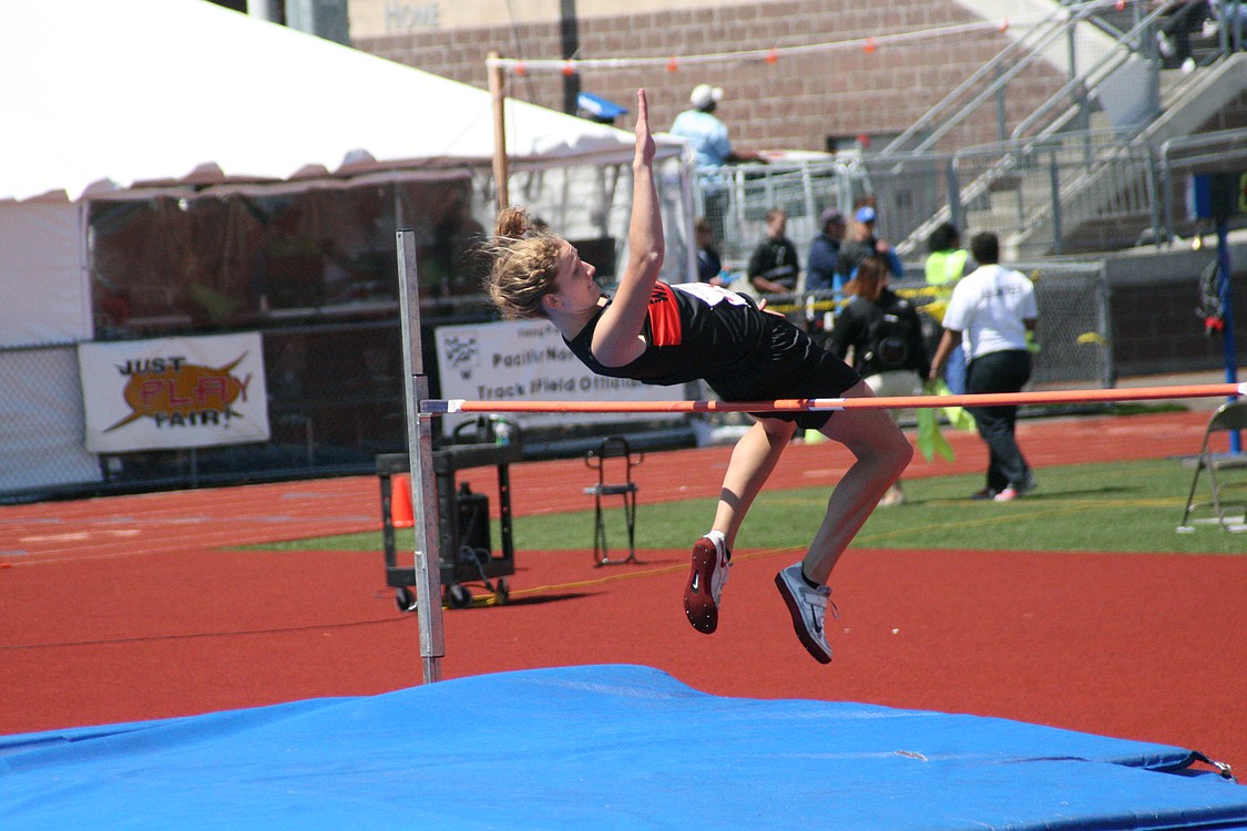 Katie Wright soars to third place in the high jump.