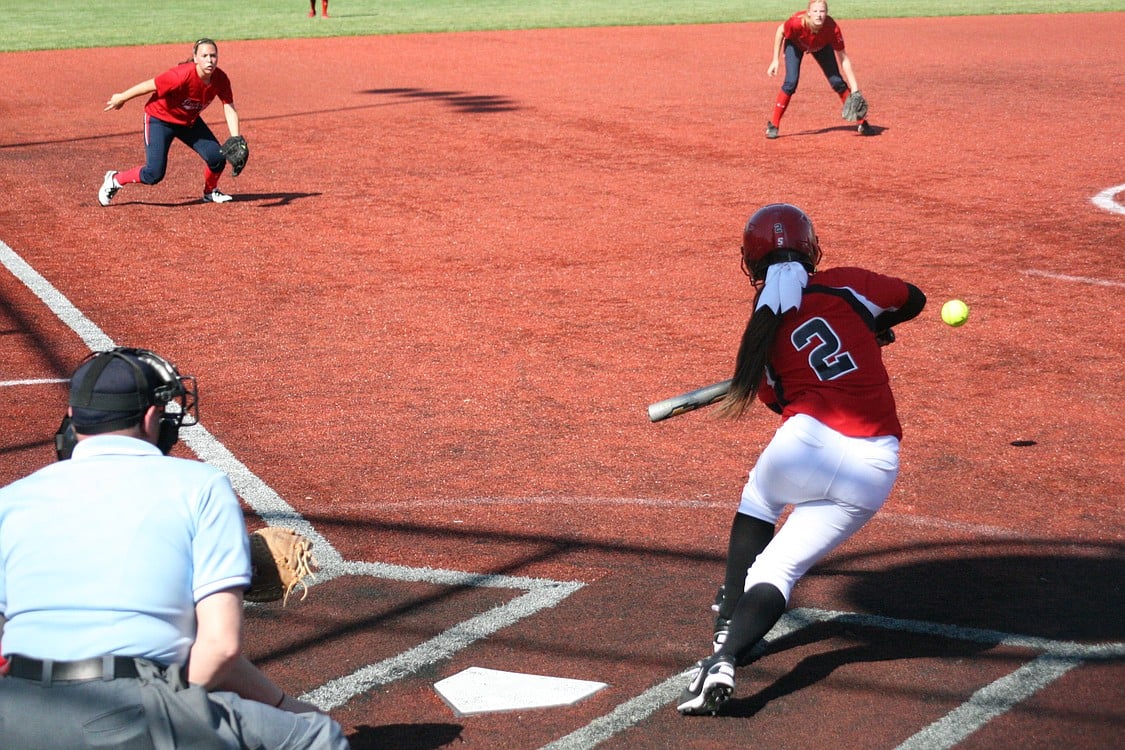 Amee Aarhus squares up to bunt.