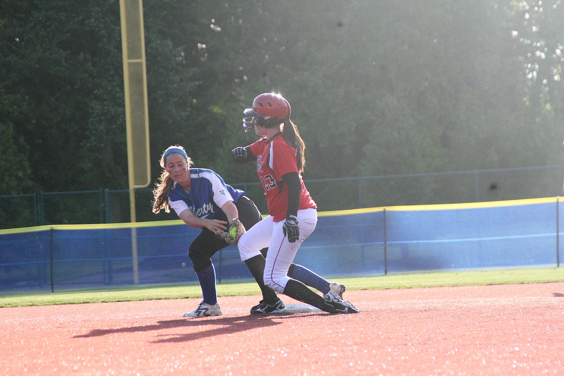 Harli Hubbard dives safely into second base with an RBI double.