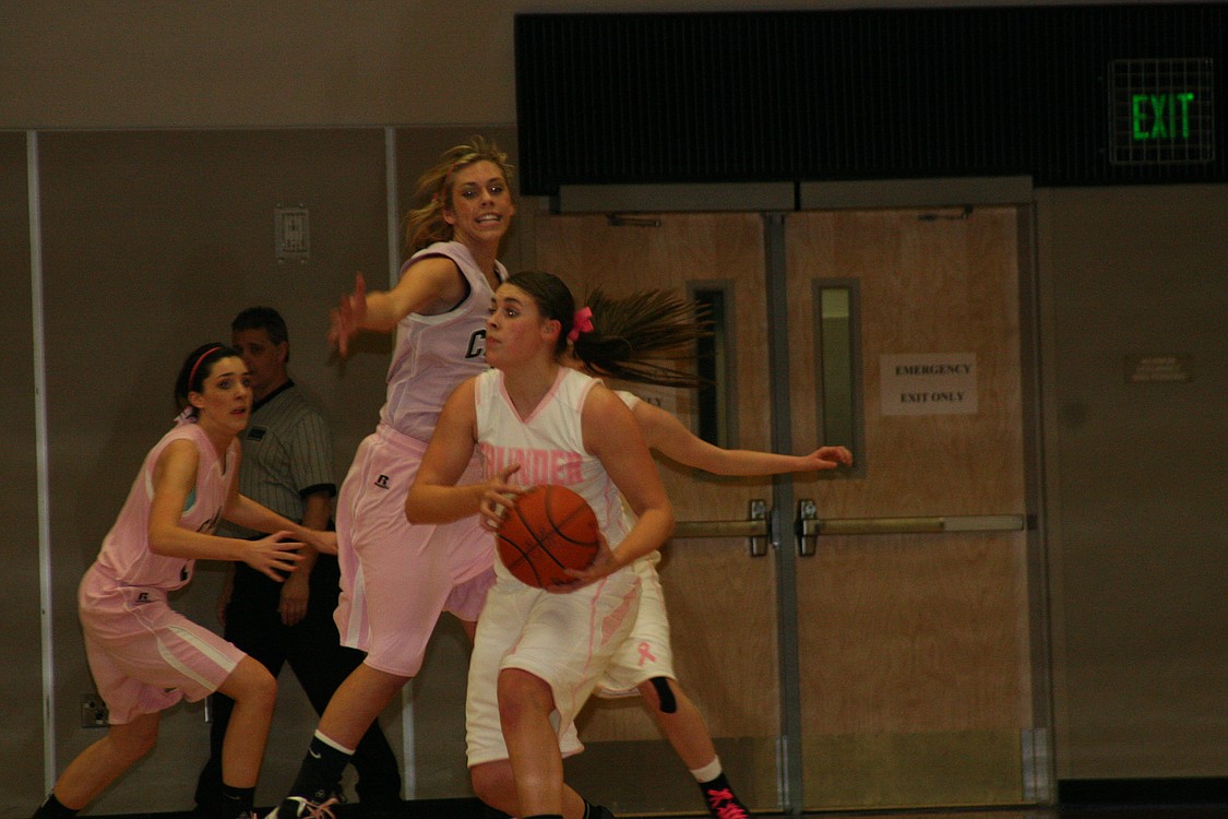 Sydney Allen and Lauren Neff on defense.