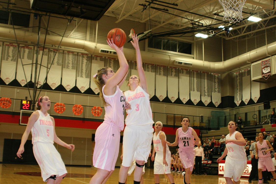 Sierra Brown shoots over the defender.