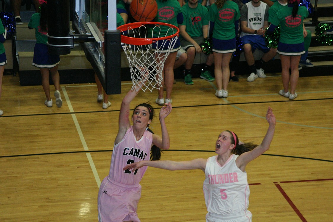 Lauren Neff nets a basket.