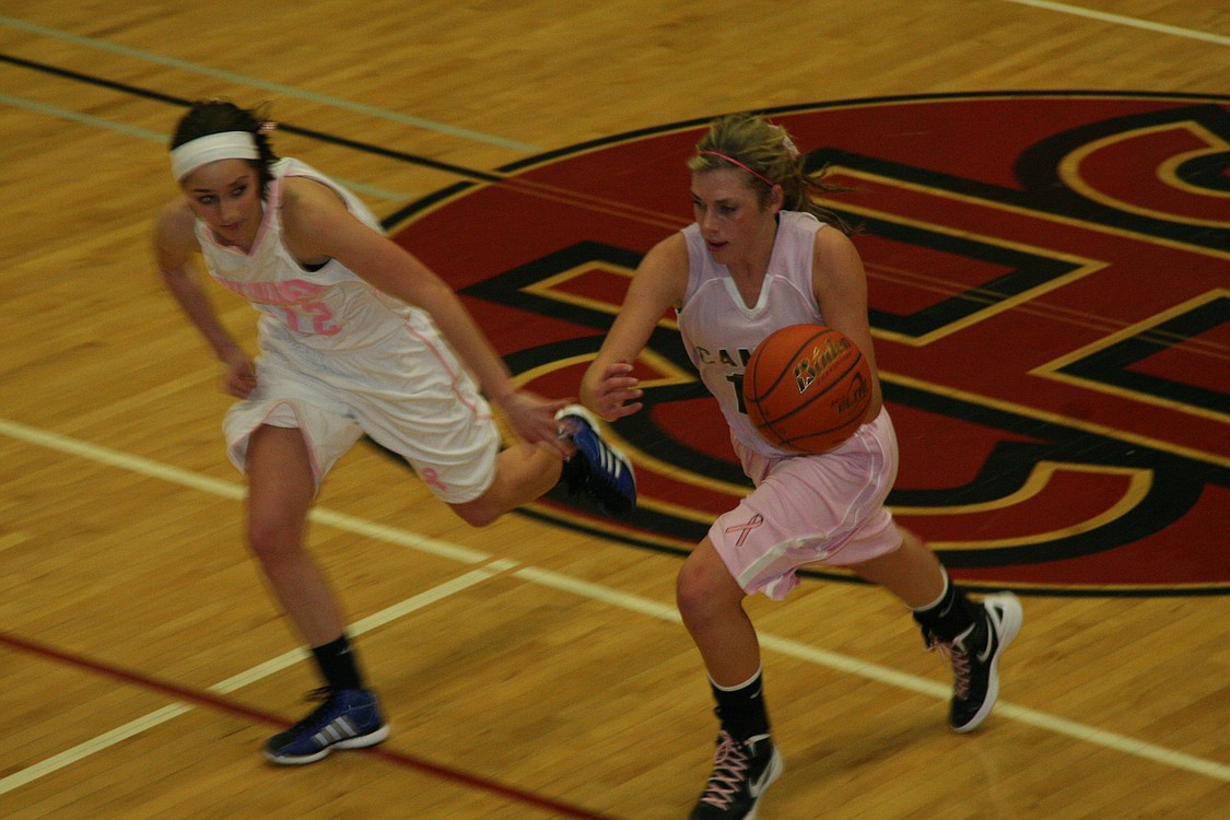 Syndey Allen gets to a loose ball.