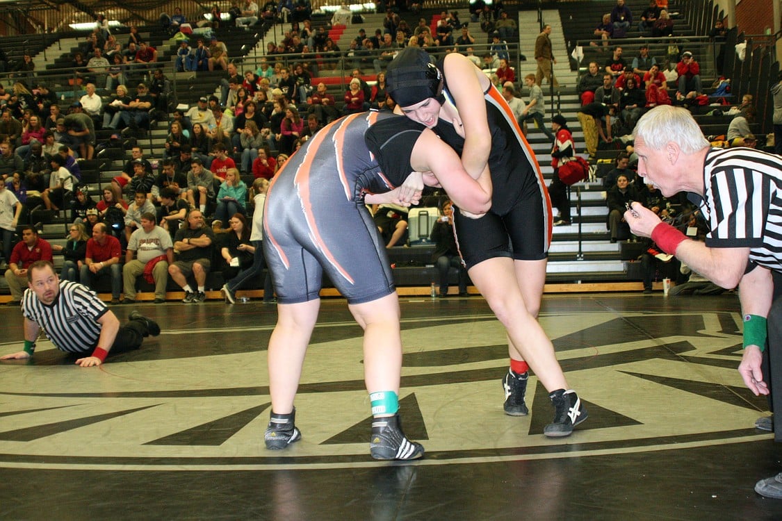 Washougal's Jessica Biron grapples with Battle Ground's Victoria Carlson in the 155-pound championship match. Biron grabbed second place.