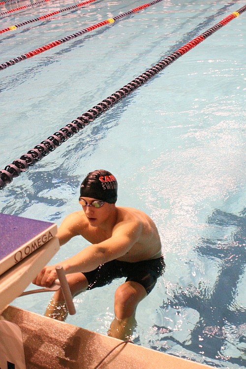 Lucas Ulmer gets ready to begin the 100 backstroke for Camas.