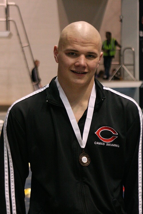 Jake Yraceburu finally broke the one minute mark in the 100 breaststroke at the state swimming meet. The Camas High School senior touched the wall in 59.88 seconds.