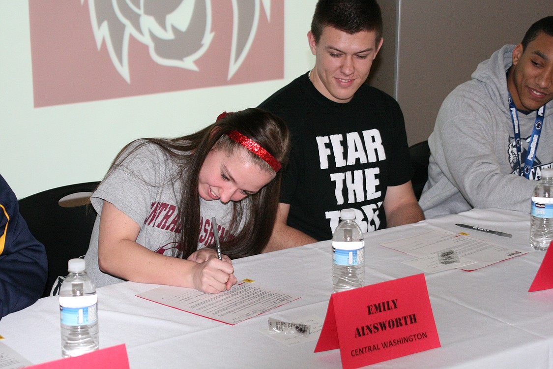 Emily Ainsworth signs with Central Washington University.