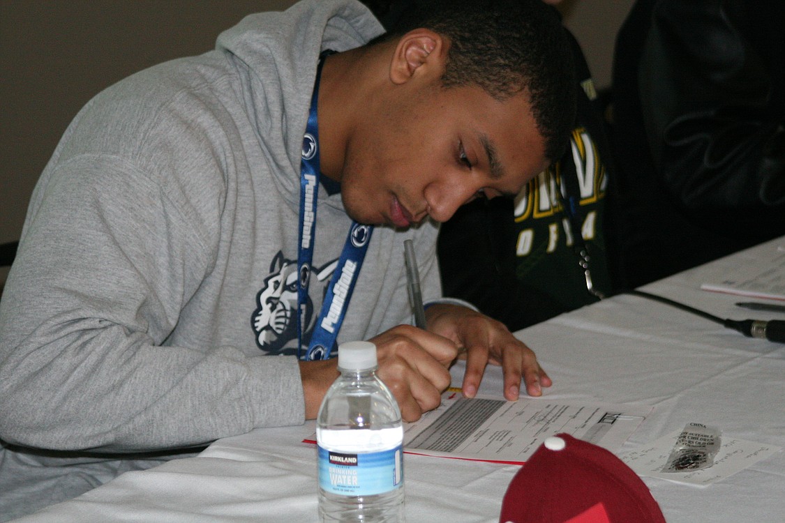 Jonathan Warner signs with Penn State University.