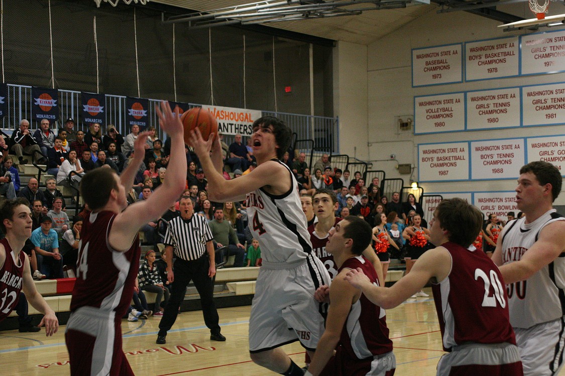 Aaron Deister attacks the basket.