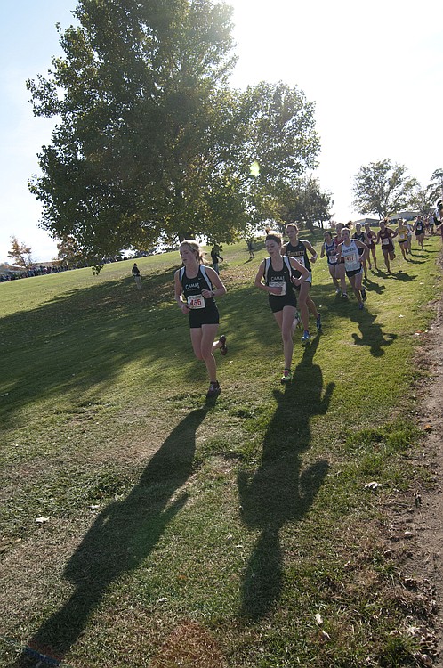 Shadows of Lindsay Wourms and Alissa Pudlitzke dominate the landscape.