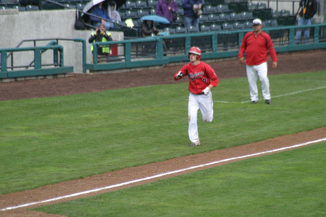 Logan Grindy cannot wait to celebrate with his temamates at home plate.