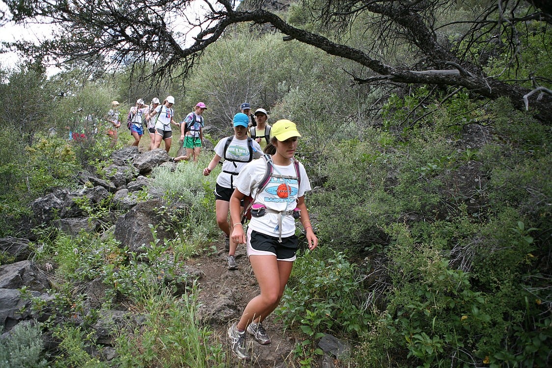 Washougal High School senior Kendall Utter leads the pack through the wilderness at the Steens Mountain Running Camp. Utter and her teammates from Oregon, Washington and Idaho earned first place in the Steens Mountain Olympic Games.