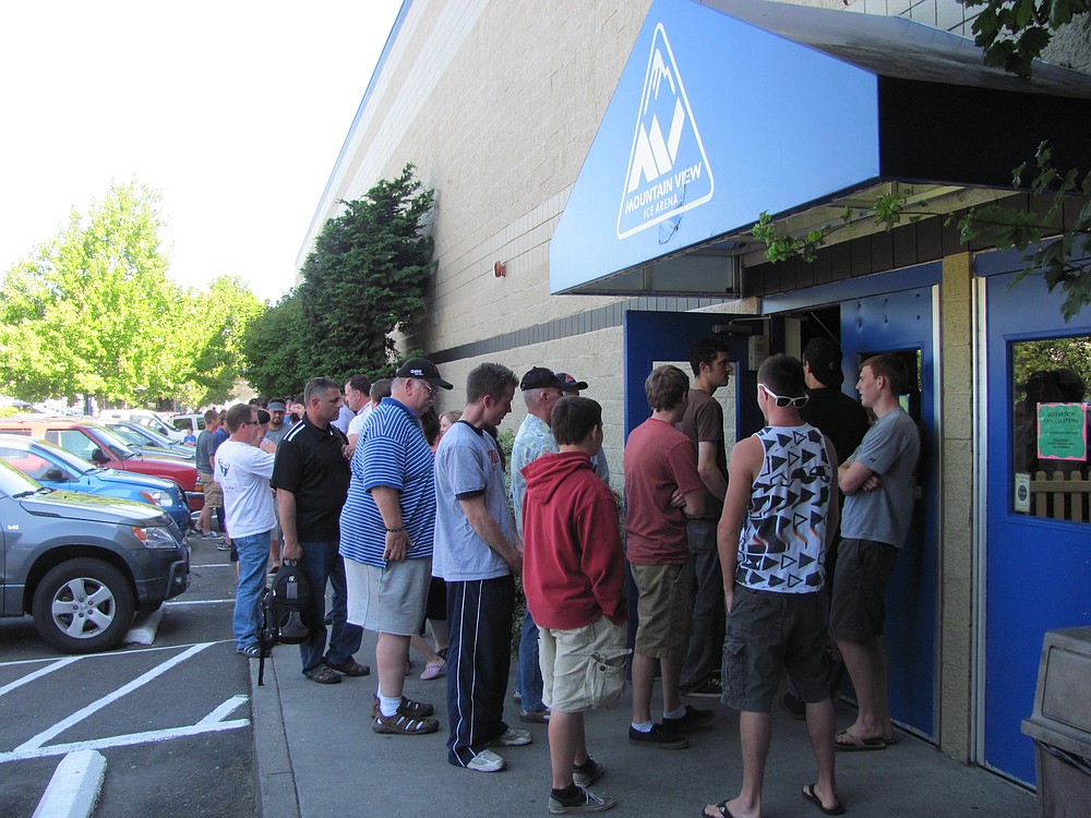 A line wraps around the Mountain View Ice Arena in Vancouver Wednesday, to see the Stanley Cup.