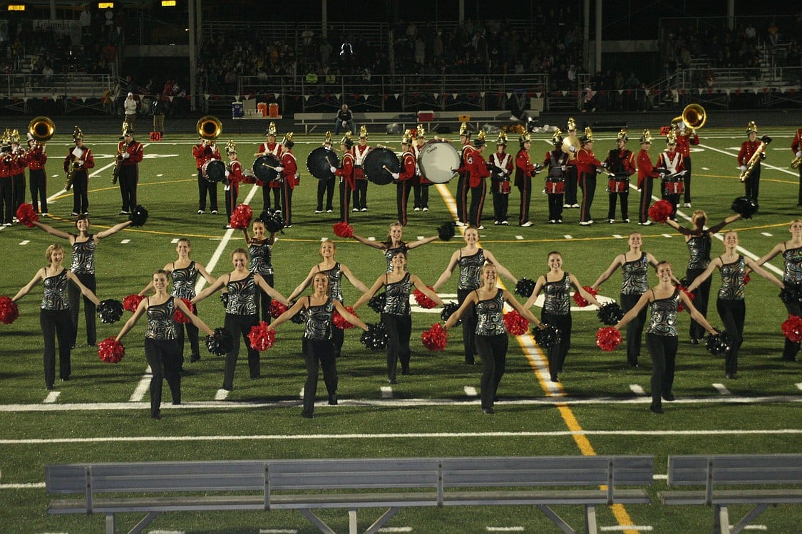 The Camas High School band and the Papershaker dancers perform together during halftime.