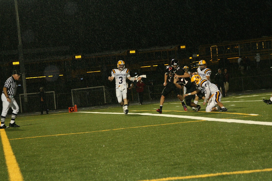 Kyle Ervin dives across the goal line for a Camas touchdown.