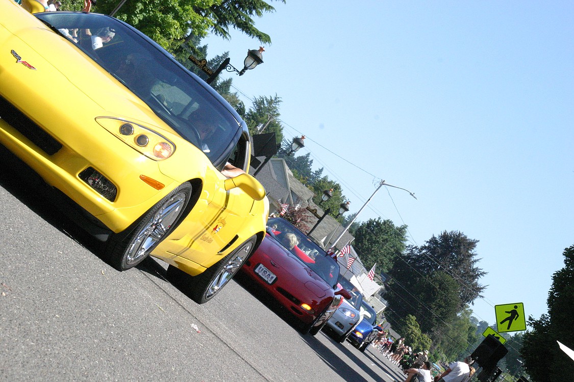 Fourteen vehicles from the Northwest Corvette Association make their way down Northeast Fourth Avenue during the Camas Days Parade on Saturday.