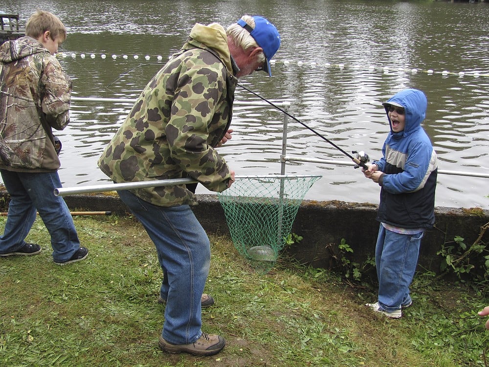 Camas students were thrilled as they caught fish after fish from Lacamas Lake on Friday morning. Moose Lodge members seemed to be having as much fun as the kids.