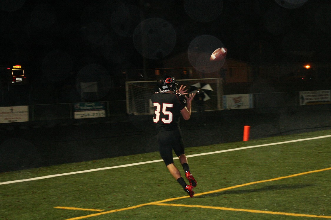 Jeremy Faulkner comes down with the game-winning touchdown for Camas in the state playoffs against Jaunita Nov. 13, at Doc Harris Stadium.